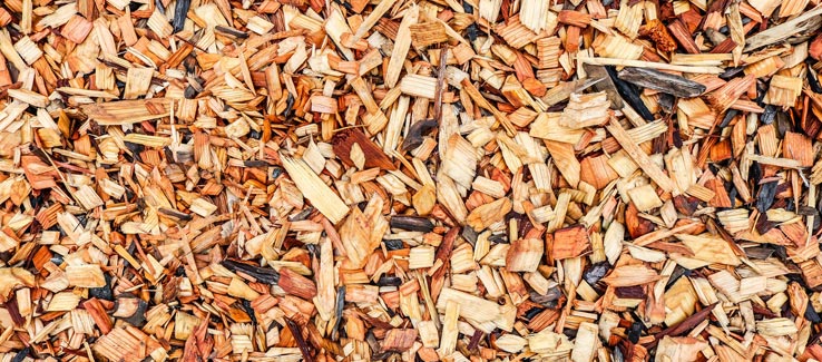 Summer garden mulch with wood chips